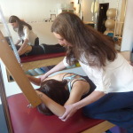 Caroline Feig, PT in a pilates session