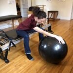 Rehab exercise with exercise ball